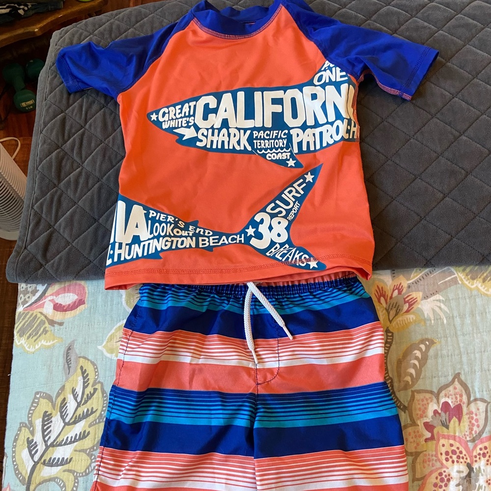 Children’s Place. Boys swim trunks with rash guard. Size medium 7/8.